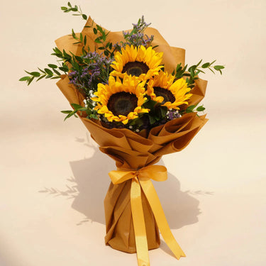 Mesmerizing Sunflowers, Beautifully Tied Bouquet, Sun Flower, Purple Limonium, White Bouvardia, Eucalyptus, Wrapped, Care Instructions